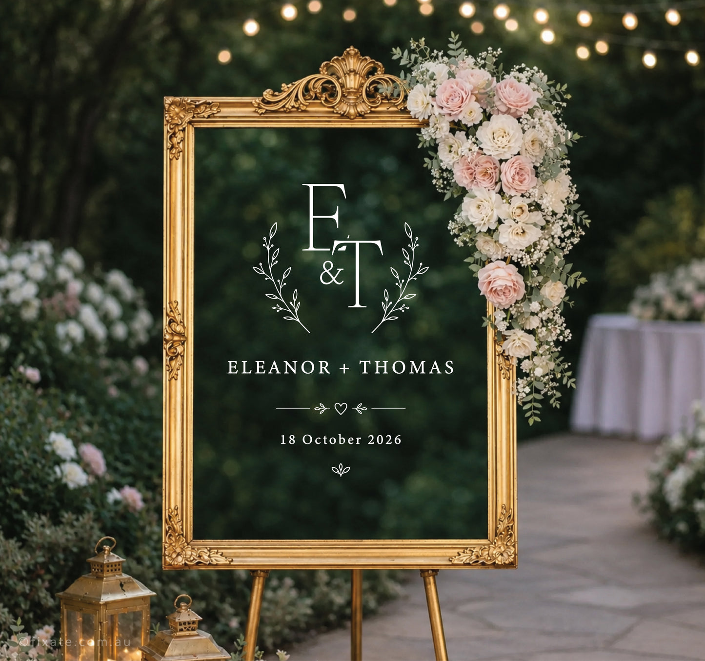 Personalised wedding mirror decal with wreath monogram, custom names, date and heart detail on ornate gold mirror