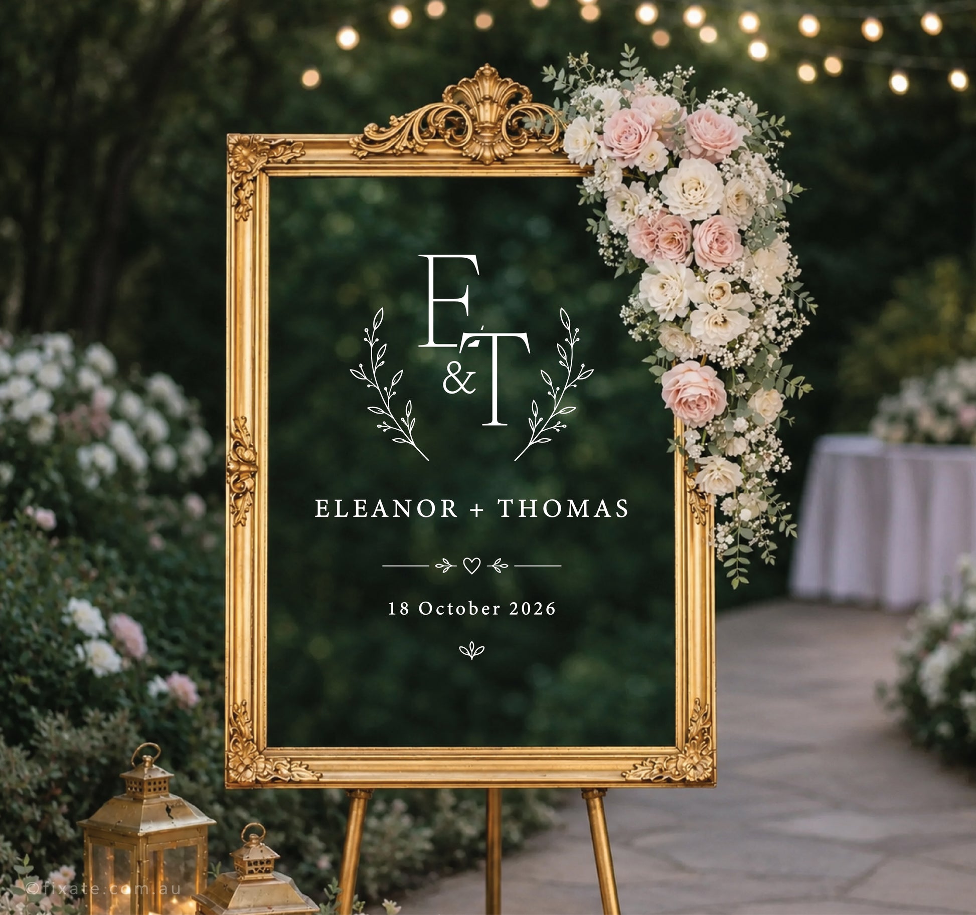 Personalised wedding mirror decal with wreath monogram, custom names, date and heart detail on ornate gold mirror