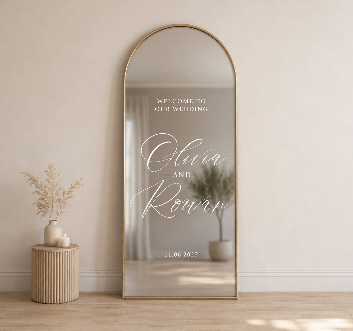 Personalised wedding mirror decal shown on arched mirror with custom names, wedding date and welcome wording