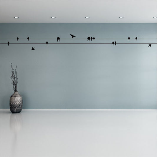 Perched birds on a wire wall sticker design